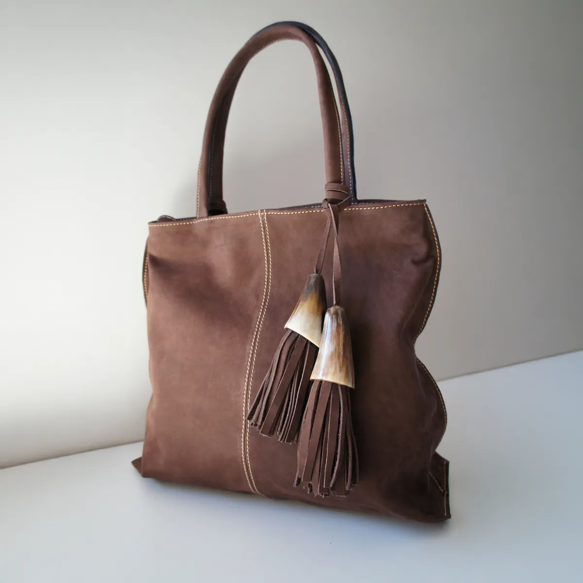 lavanderia a domicilio en lima especializado carteras bolsos cuero gamuza